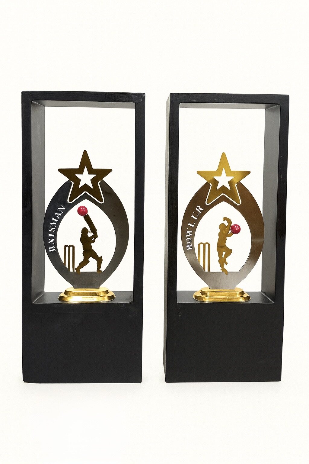 Best Batsman and Best Bowler metal trophies in black display frames