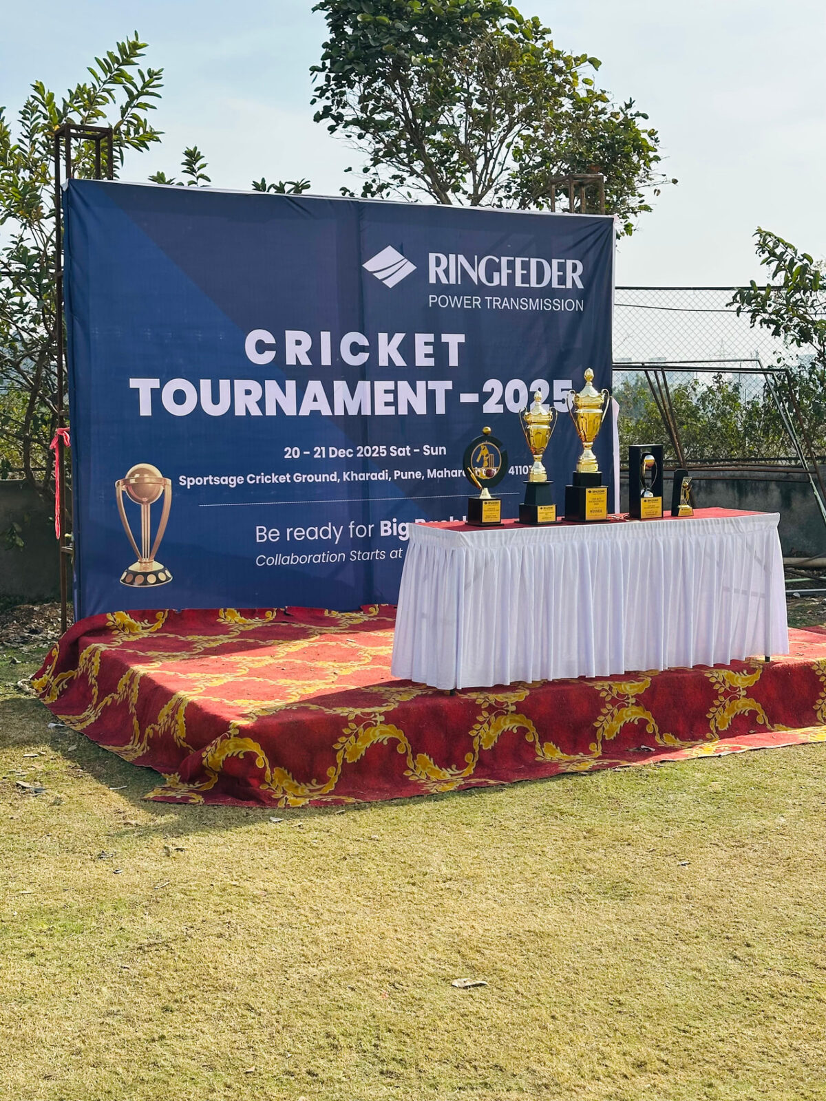 Corporate cricket tournament trophy presentation setup